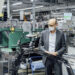Volkswagen brand CEO Ralf Brandstätter finds out more about door assembly on the production line in Zwickau at the start of ID.4 series production.